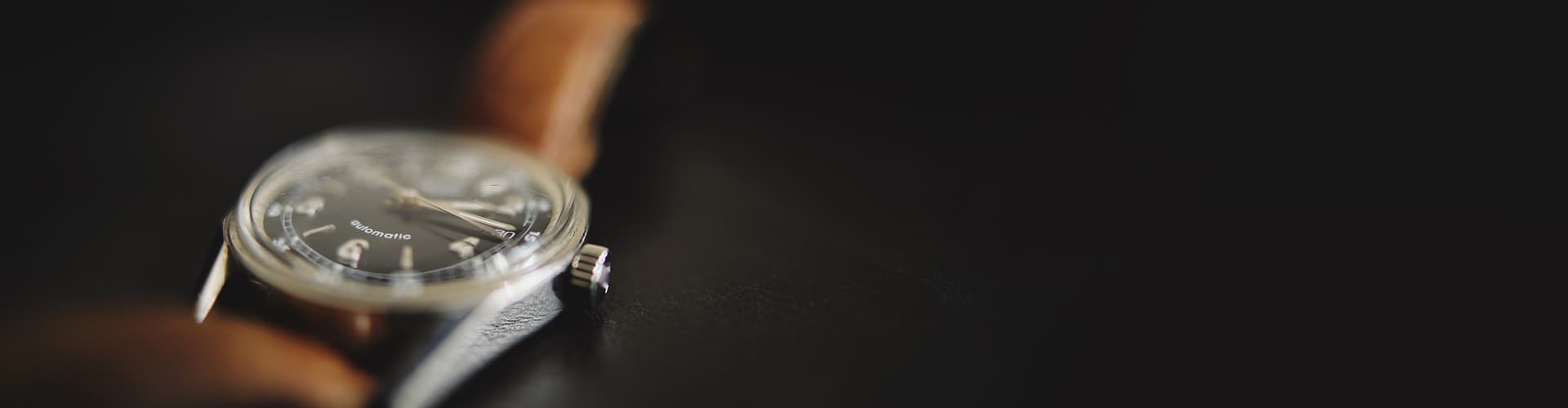 A watch resting on a table.