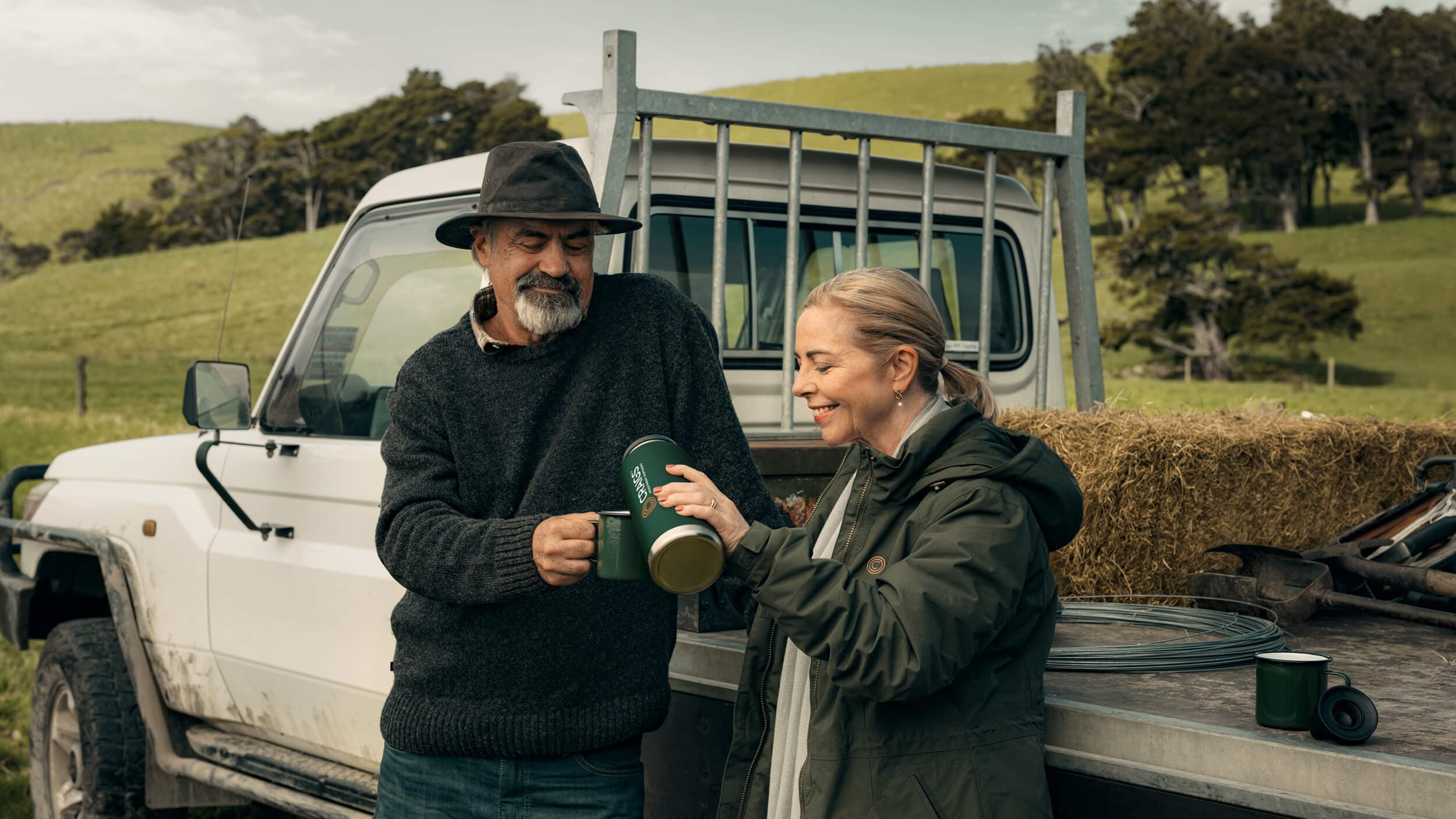 Adviser helping client on the farm.